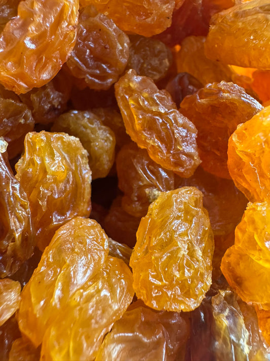 Close-up of dried golden raisins